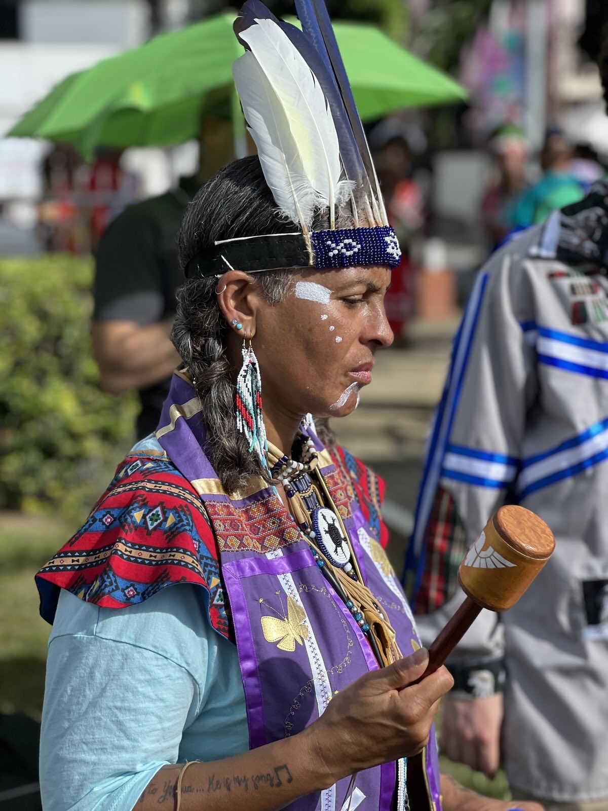 Band members in traditional indigenous regalia